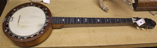 Early 20th century inlaid rosewood resonator banjo, 39in.(-)